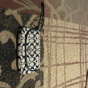Like new Authentic Coach Wristlet in Black and Grey
